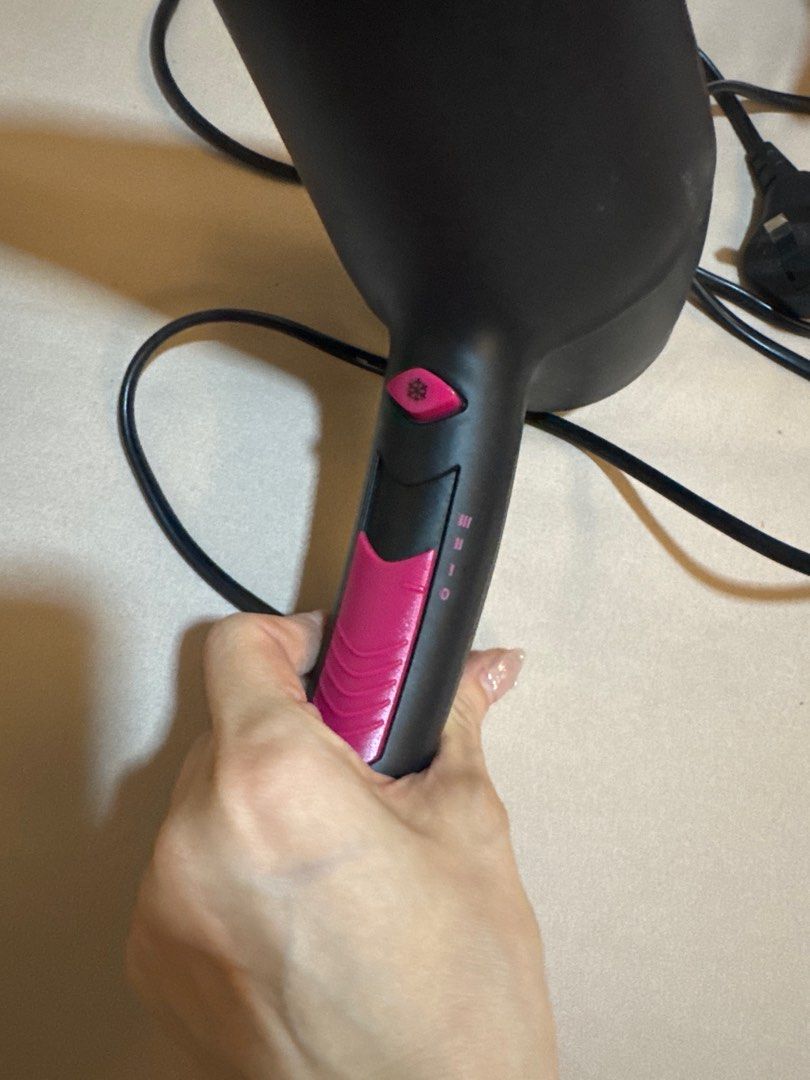 VS Sassoon Hair Dryer with Diffuser (Category: Hair) located in Makati City. Submitted by closetcleanup_things (Listing ID 1411709856, Image 2). Description: - VS Sassoon hair dryer with pink accent - Includes diffuser attachment - Multiple heat and speed settings - Standard plug - In good working condition.