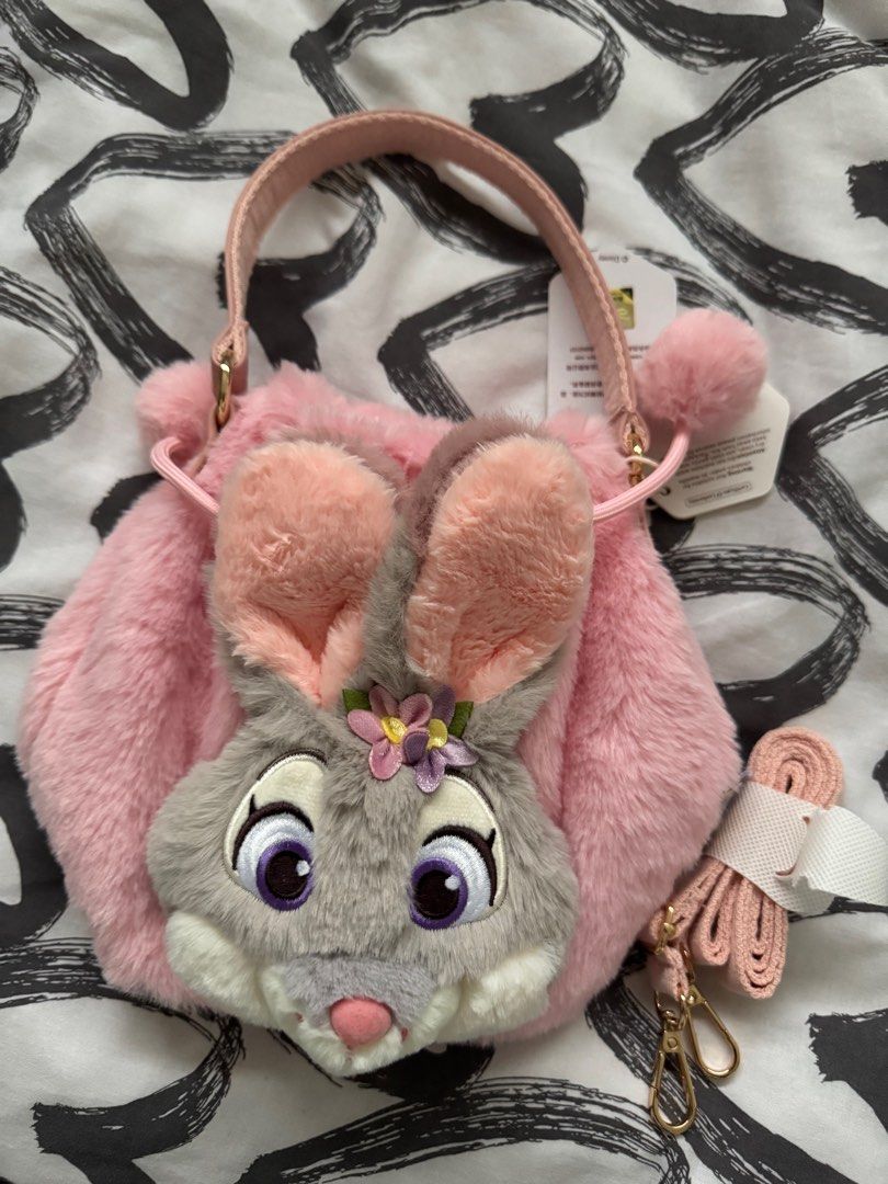 Zootopia Judy Hops. Pink bucket bag (Category: Cross-body Bags) located in Rizal. Submitted by katmandulovesmakeup (Listing ID 1411675579, Image 3). Description: Brandnew and Authentic Zootopia pink bucket bag With tags Zootopia merch Judy Hopps bucket bag with crossbody strap.
