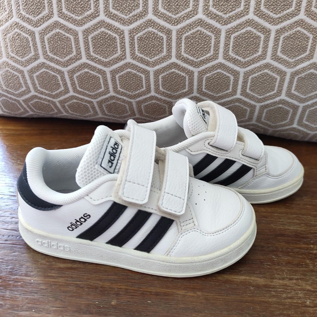 Adidas Kid's Shoes (Category: Babies & Kids Fashion) located in Imus. Submitted by decluttering_millennial (Listing ID 1411875382, Image 2). Description: Adidas shoes for kids Almost good as new, with minor yellowing on the soles RFS: Outgrown already.