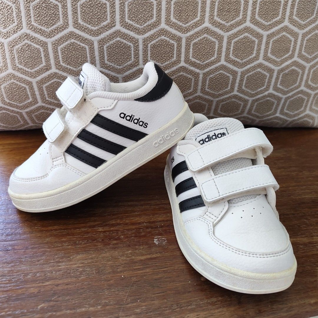 Adidas Kid's Shoes (Category: Babies & Kids Fashion) located in Imus. Submitted by decluttering_millennial (Listing ID 1411875382, Image 1). Description: Adidas shoes for kids Almost good as new, with minor yellowing on the soles RFS: Outgrown already.