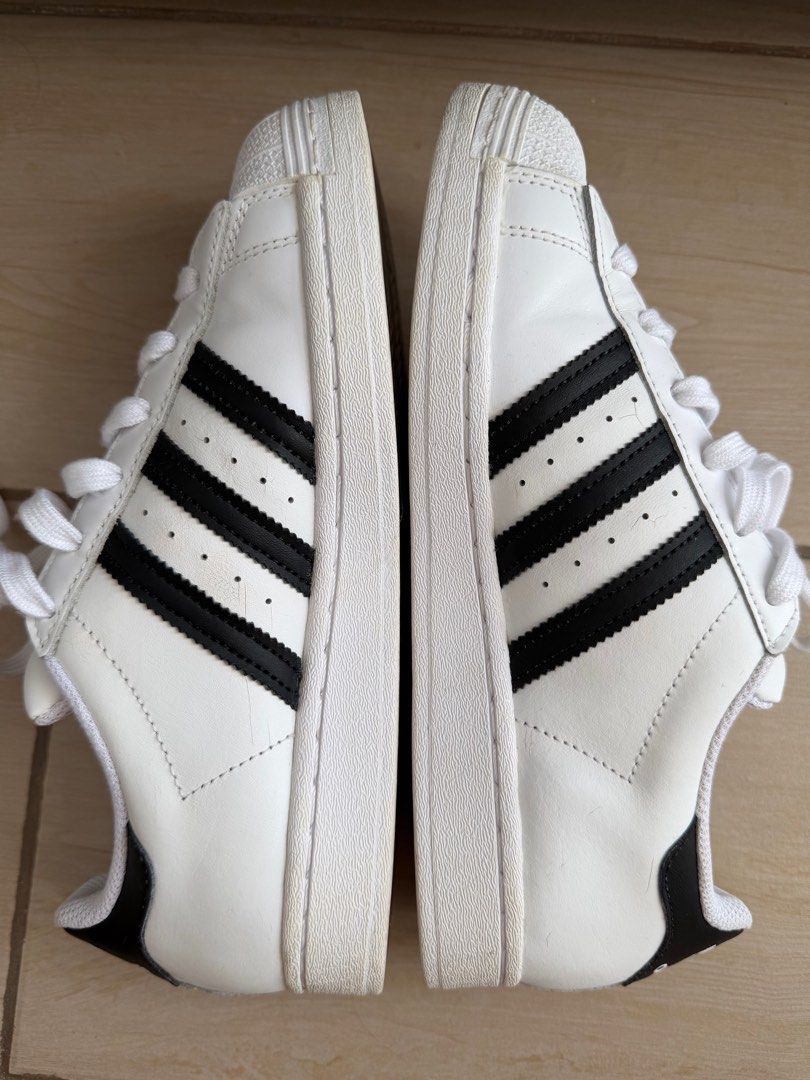 Adidas Superstar White Black (Category: Sneakers) located in Taguig. Submitted by BellaC (Listing ID 1411844540, Image 2). Description: - Adidas Superstar - White with black stripes - US size 6 - Classic shell toe - Made in Indonesia - Some sole wear.