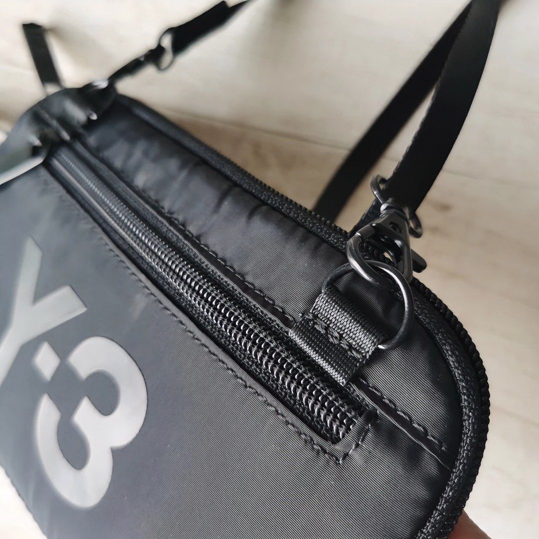 Adidas Y-3 YOHJI YAMAMOTO POUCH Classic Logo Print Nylon Waterproof Small Shoulder Bag/Crossbody Bag 19*2*11cm (Category: Sling Bags) located in Singapore. Submitted by pickplanet_sneaker_shirt (Listing ID 1411801917, Image 9). Description: 19*2*11cm Express delivery takes about 10-12 days to sg, Sorry for the urgent order. Products are continuously updated,Welcome to consult..