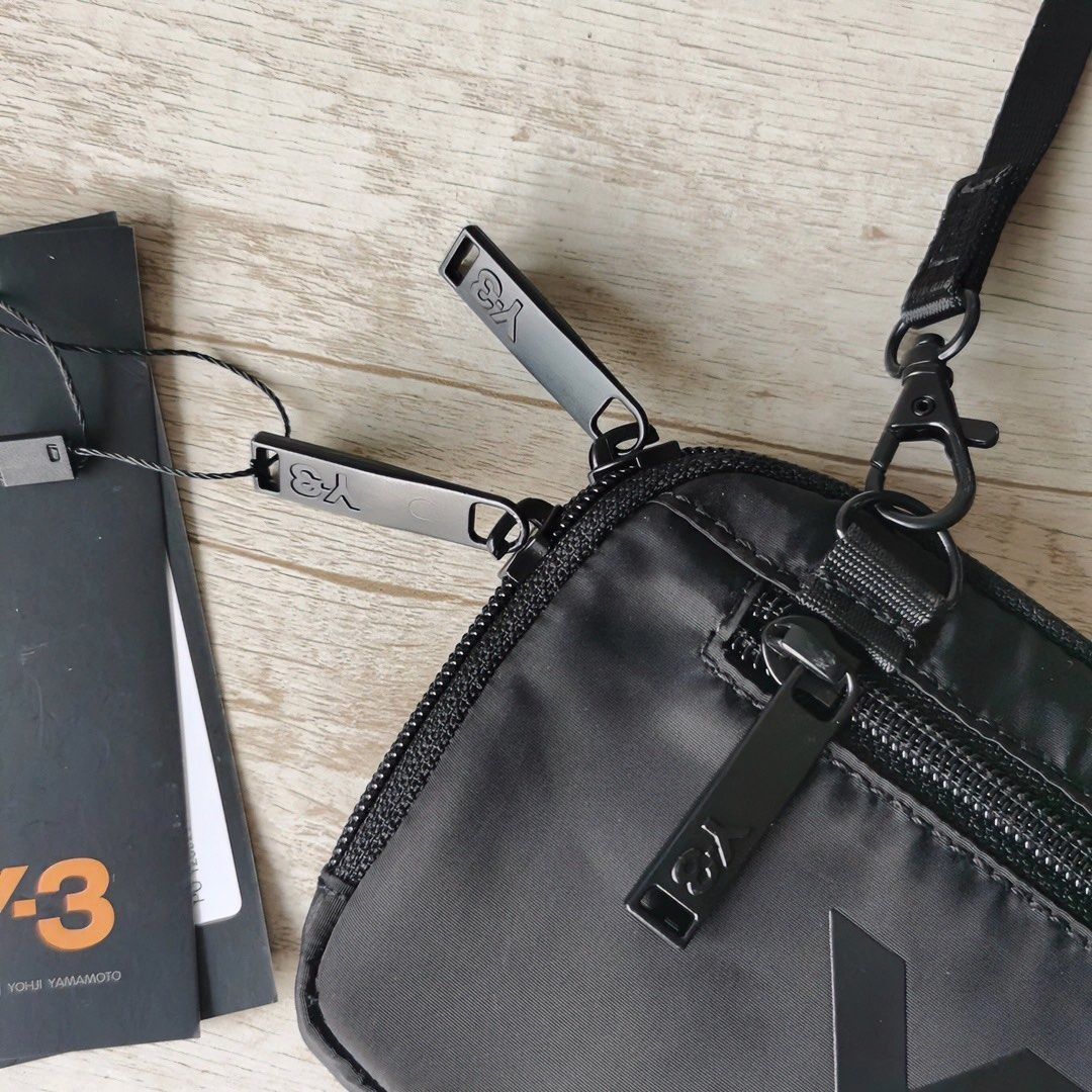 Adidas Y-3 YOHJI YAMAMOTO POUCH Classic Logo Print Nylon Waterproof Small Shoulder Bag/Crossbody Bag 19*2*11cm (Category: Sling Bags) located in Singapore. Submitted by pickplanet_sneaker_shirt (Listing ID 1411801917, Image 8). Description: 19*2*11cm Express delivery takes about 10-12 days to sg, Sorry for the urgent order. Products are continuously updated,Welcome to consult..
