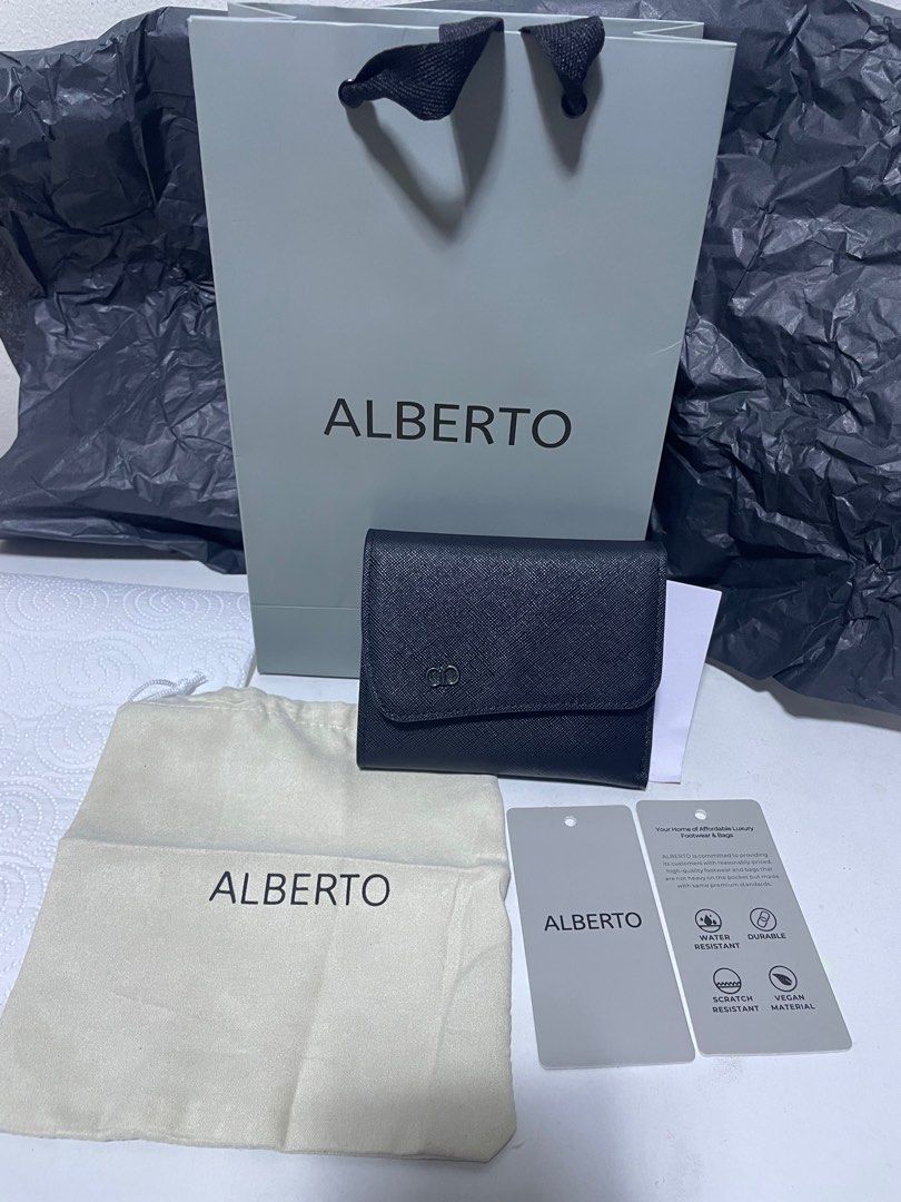 Alberto Unisex Black Wallet (Category: Luxury Bags & Wallets) located in Manila. Submitted by yanggggggie (Listing ID 1411796958, Image 1). Description: - Like brand new - Used twice - With paperbag, tags - RFS: i received new gift wallet.