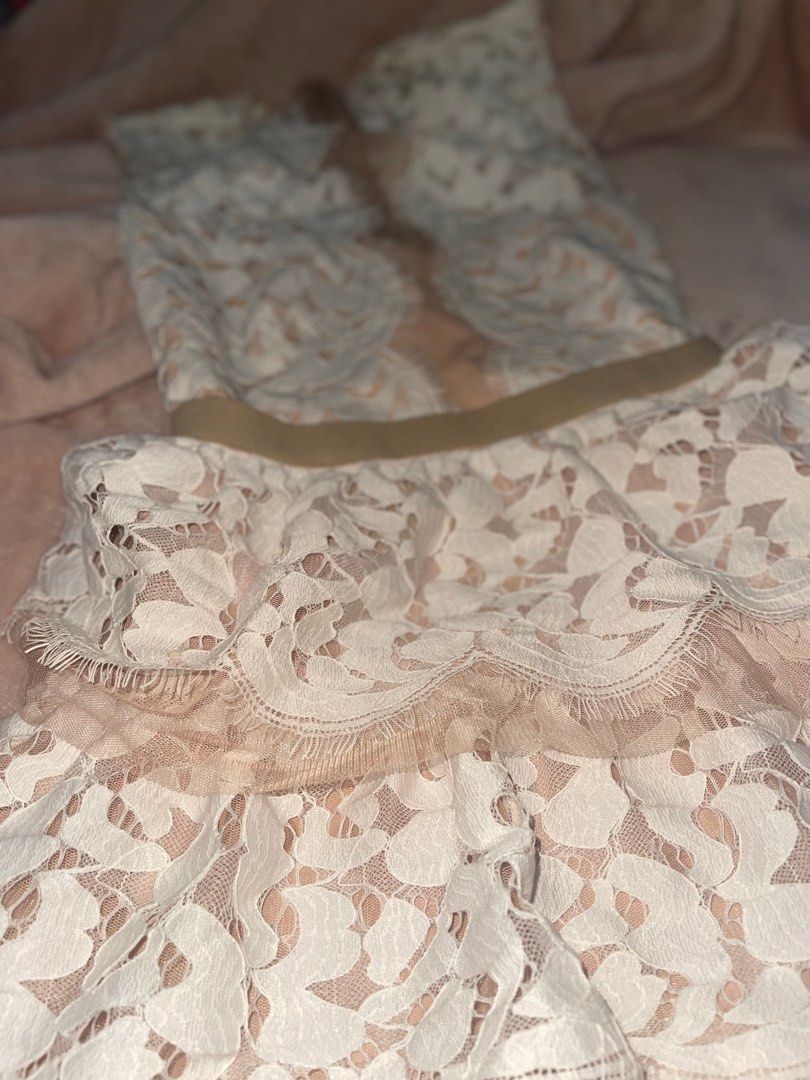 BCBGMAXAZRIA Cream Lace Dress (Category: Dresses) located in Quezon City. Submitted by lavenderpancake (Listing ID 1411945283, Image 3). Description: - BCBGMAXAZRIA dress - Size 2 (XXS / XS frame) - Elegant white lace overlay - Nude-colored lining - Tiered skirt ——————— ₱500 is good for 3 days —— - SFs are shouldered by the renter - must be dry clean upon returning - late or excess day fee : ₱100 - 500 deposit ( to be returned after 24 hours afte
