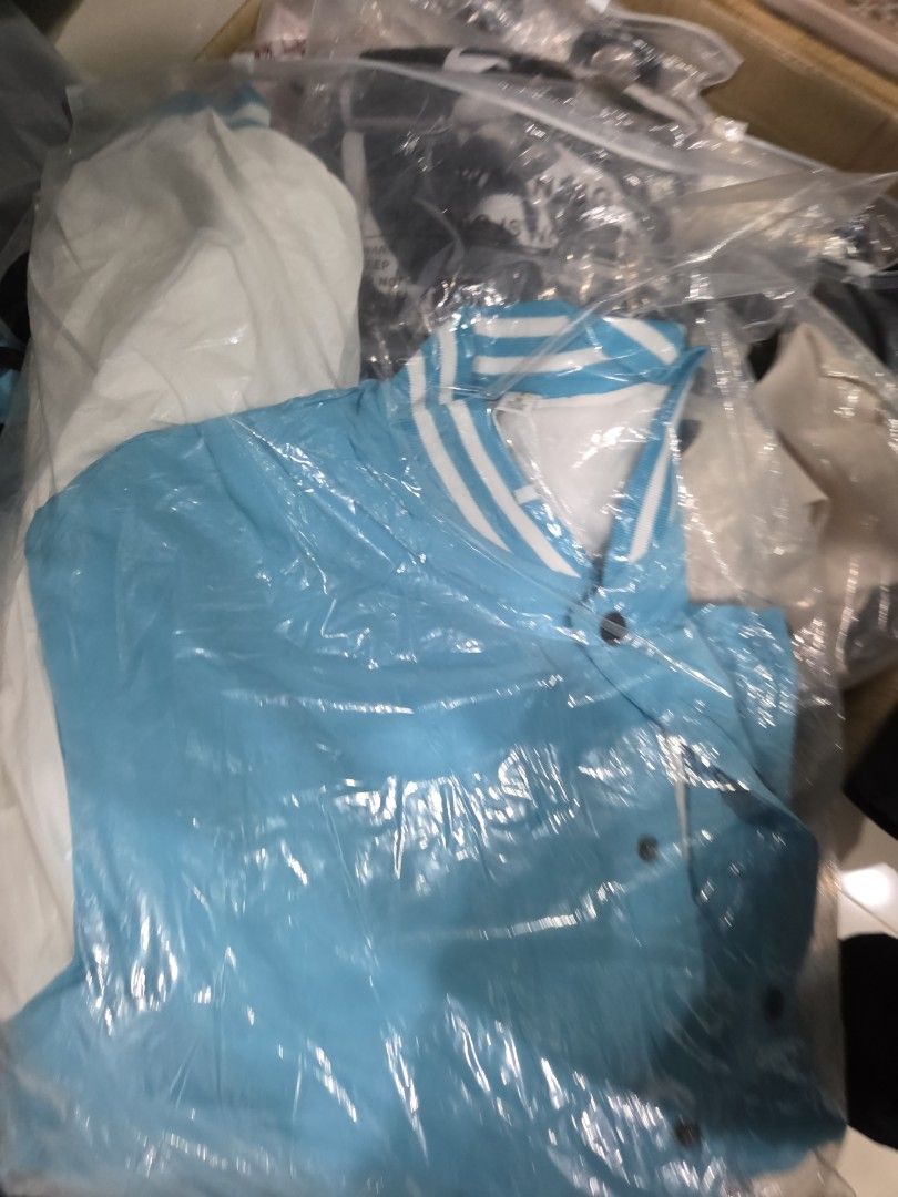 Blue puffer Varsity Jacket (Category: Coats, Jackets and Outerwear) located in Manila. Submitted by kayencee_27 (Listing ID 1411932883, Image 1). Description: Brand new Varsity Jacket With individual pouch Color blue white combi Snap button with inner lining (puffer) Width the pockets inner Width - 19"-20" Length - 25".