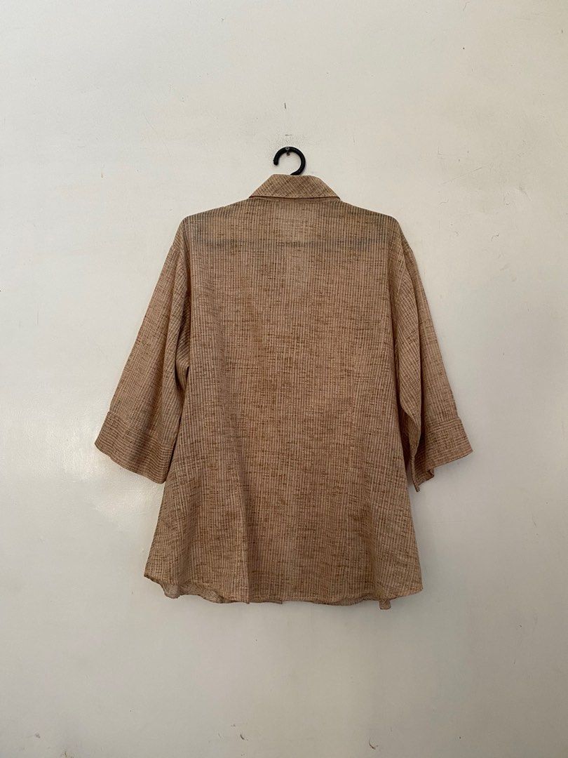 Brown Polo (Category: Blouses) located in Minalin. Submitted by stuffseri (Listing ID 1411789151, Image 2). Description: • Size - XXXL (DM for deets) • RFS: Decluttering • what you see is what you get • PAYO - gcash • sf will be shouldered by buyer - price varies depending on the location • no to joy miners and bogus buyers ‼️.