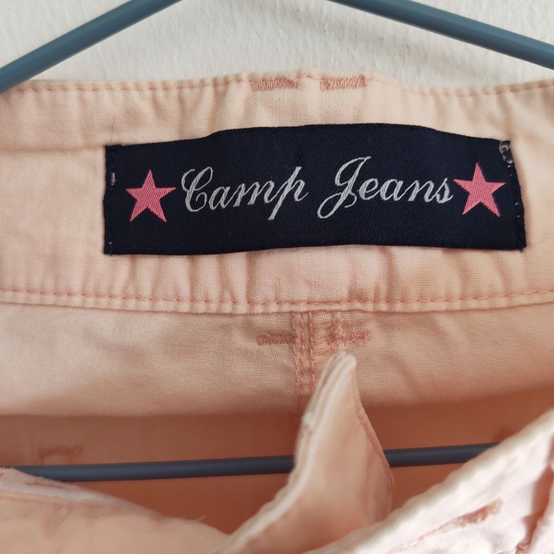 Camp Jeans Pleated Mini Skirt (Category: Skirts) located in Imus. Submitted by decluttering_millennial (Listing ID 1411872908, Image 3). Description: - Camp Jeans mini skirt - Light pink - Size 27 - Pleated hem, front and back pockets, button closure and belt loops - Very Y2K; easy to pair skirt with other tops.