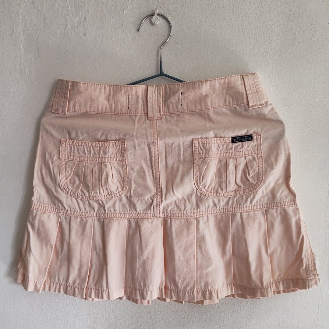 Camp Jeans Pleated Mini Skirt (Category: Skirts) located in Imus. Submitted by decluttering_millennial (Listing ID 1411872908, Image 2). Description: - Camp Jeans mini skirt - Light pink - Size 27 - Pleated hem, front and back pockets, button closure and belt loops - Very Y2K; easy to pair skirt with other tops.