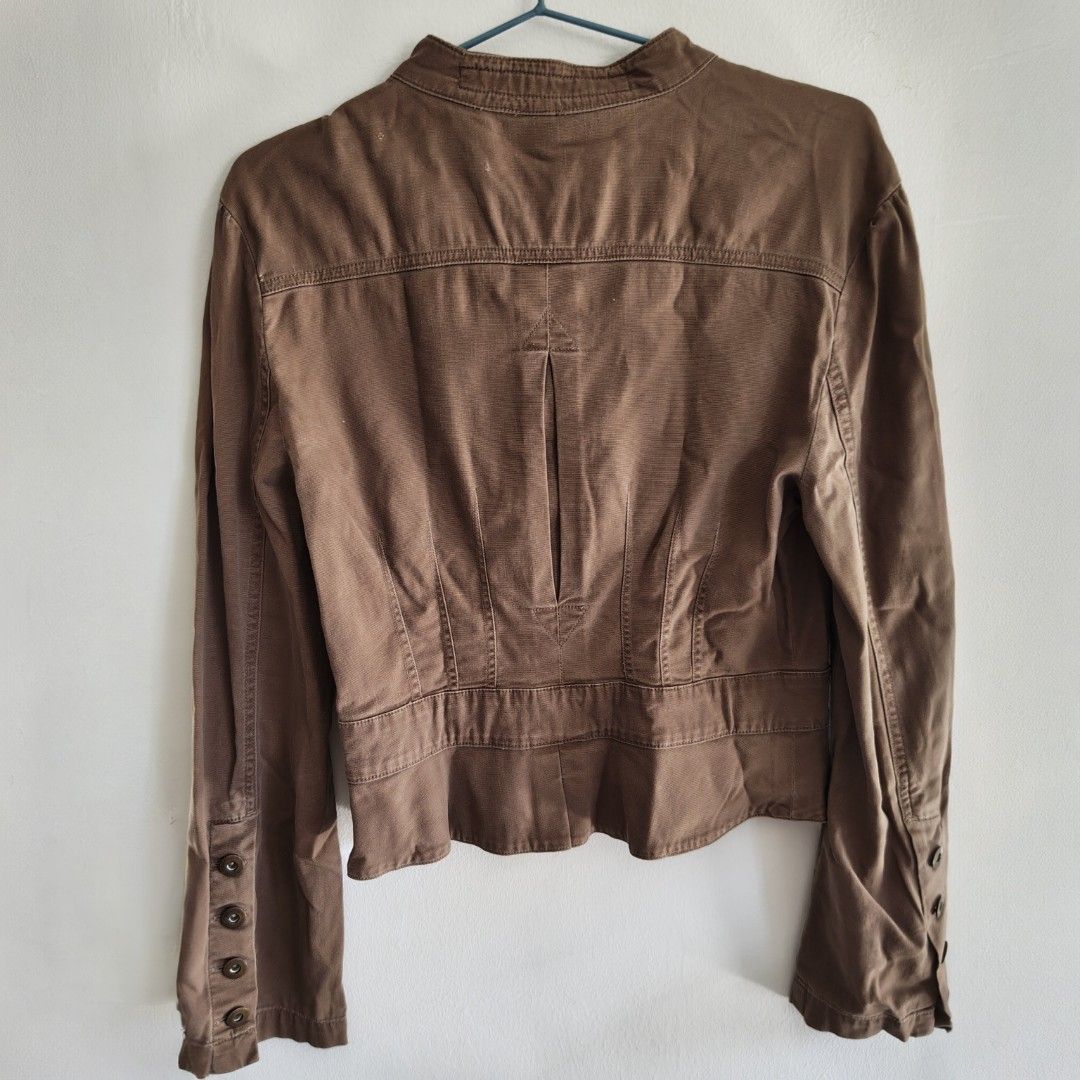 Dickies Girl USA Brown Jacket (Category: Coats, Jackets and Outerwear) located in Imus. Submitted by decluttering_millennial (Listing ID 1411874927, Image 3). Description: - Dickies Girl brown jacket - Size: M - Long sleeves with buttoned cuffs - Tailored back design - With minor flaws. See last photo..