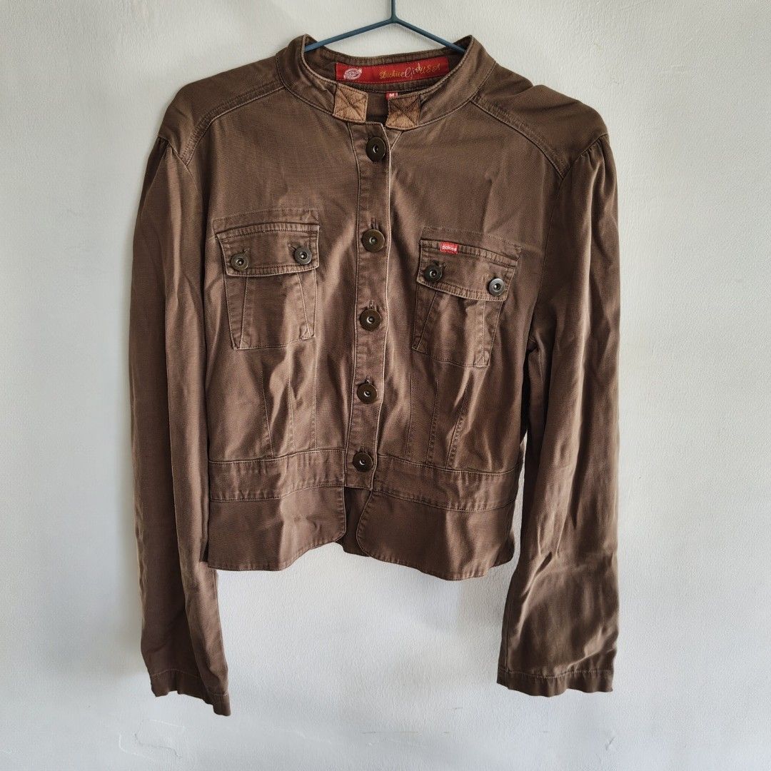 Dickies Girl USA Brown Jacket (Category: Coats, Jackets and Outerwear) located in Imus. Submitted by decluttering_millennial (Listing ID 1411874927, Image 2). Description: - Dickies Girl brown jacket - Size: M - Long sleeves with buttoned cuffs - Tailored back design - With minor flaws. See last photo..