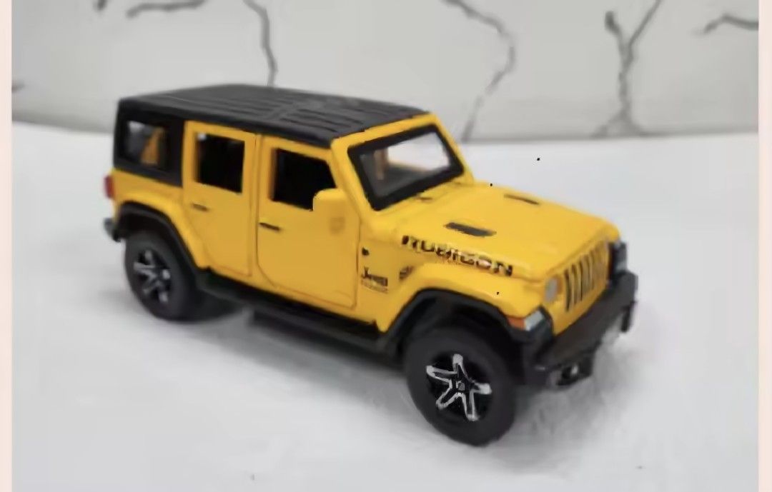 Diecast Jeep Wrangler Rubicon model Scale 1:32 (Category: Vehicle & Diecast Models) located in Manila. Submitted by jimtonline1206 (Listing ID 1411811704, Image 3). Description: - Detailed diecast Jeep Wrangler Rubicon model Scale 1:32 - Available colors: Red, Yellow, White - Features: - Opening doors -Movable Wheels -Alloy + Rubber Tires - Black rims and roof.