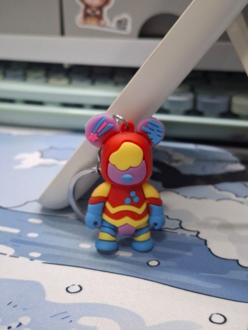 Disney Mickey Mouse Soft Silicone Keychain or Bag Charm (Category: Character Goods) located in Manila. Submitted by riri_laine (Listing ID 1411913210, Image 2). Description: Cute colorful Mickey Mouse keychain! Features a colorful design with red, yellow, and blue accents. Made of rubber-like material with a silver ring..