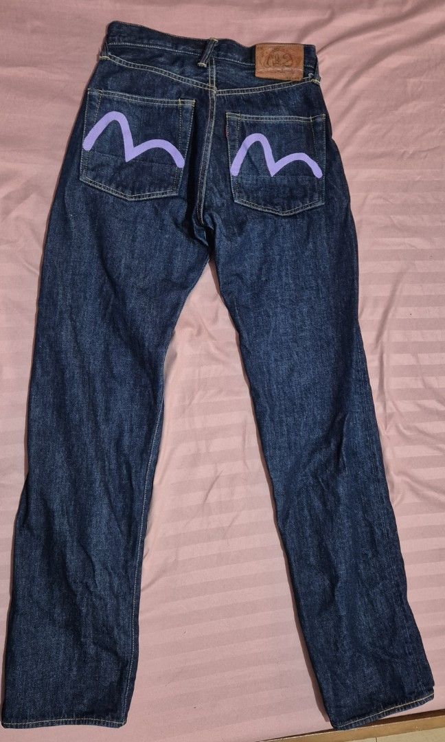 EVISU Jeans 28x35 Made in Japan (Category: Jeans) located in Marikina City. Submitted by mackie00 (Listing ID 1411906251, Image 2). Description: - Authentic EVISU jeans - Made in Japan - Size: 28x35 - Iconic seagull logo - Button fly - Classic dark wash - Red selvedge detail - Unique pocket lining pattern - Waist: Approximately 14 inches - Inseam: Approximately 27 inches - Might fit best for size 26- 27 - Other measurements in photos (inches) - R