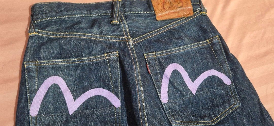 EVISU Jeans 28x35 Made in Japan (Category: Jeans) located in Marikina City. Submitted by mackie00 (Listing ID 1411906251, Image 1). Description: - Authentic EVISU jeans - Made in Japan - Size: 28x35 - Iconic seagull logo - Button fly - Classic dark wash - Red selvedge detail - Unique pocket lining pattern - Waist: Approximately 14 inches - Inseam: Approximately 27 inches - Might fit best for size 26- 27 - Other measurements in photos (inches) - R