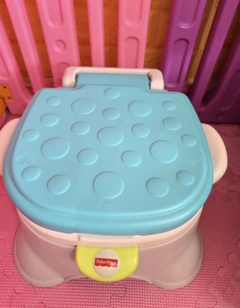 Fisherprice Royal Stepstool Potty (Category: Toilet Training) located in Quezon City. Submitted by lorenandi (Listing ID 1411926569, Image 3). Description: ♡ Original retail price: P1,600 ♡ Dimensions (cm): 21 x 35 x 35 ♡ Plays 4 Royal Tunes ♡ Built in splash guard for boys ♡ Lid folds down to convert to a sturdy stepstool for kids up to 200lbs (90kg) ♡ With removable bowl for easy clean-up.