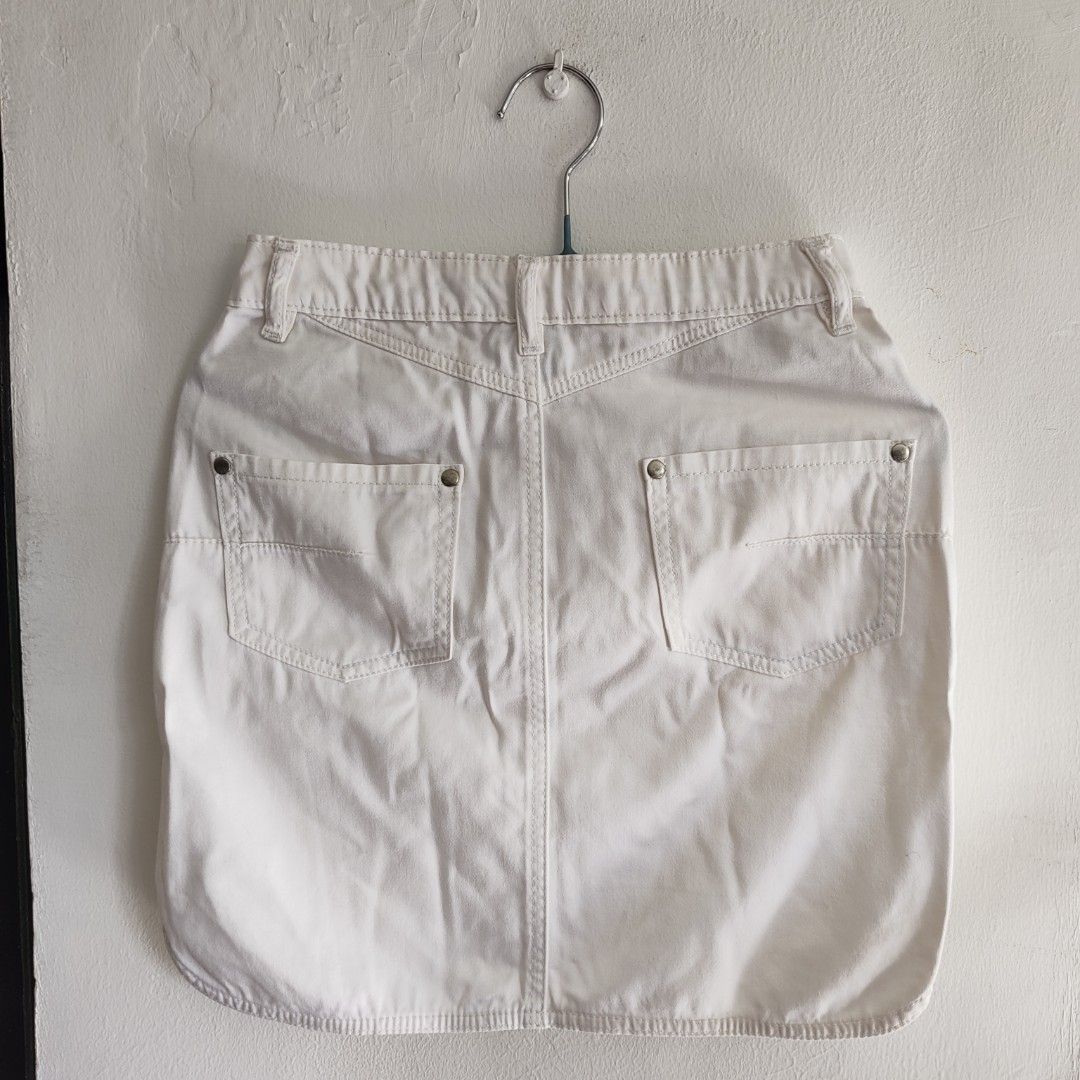 Freeway White Denim Skirt XS (Category: Skirts) located in Imus. Submitted by decluttering_millennial (Listing ID 1411873229, Image 2). Description: - Freeway white denim skirt - Mini length - Size: XS (US 0, EU XS) - Features: Button-down front, front and back pockets - Material: Sturdy denim - Perfect for casual outfits - Versatile style.