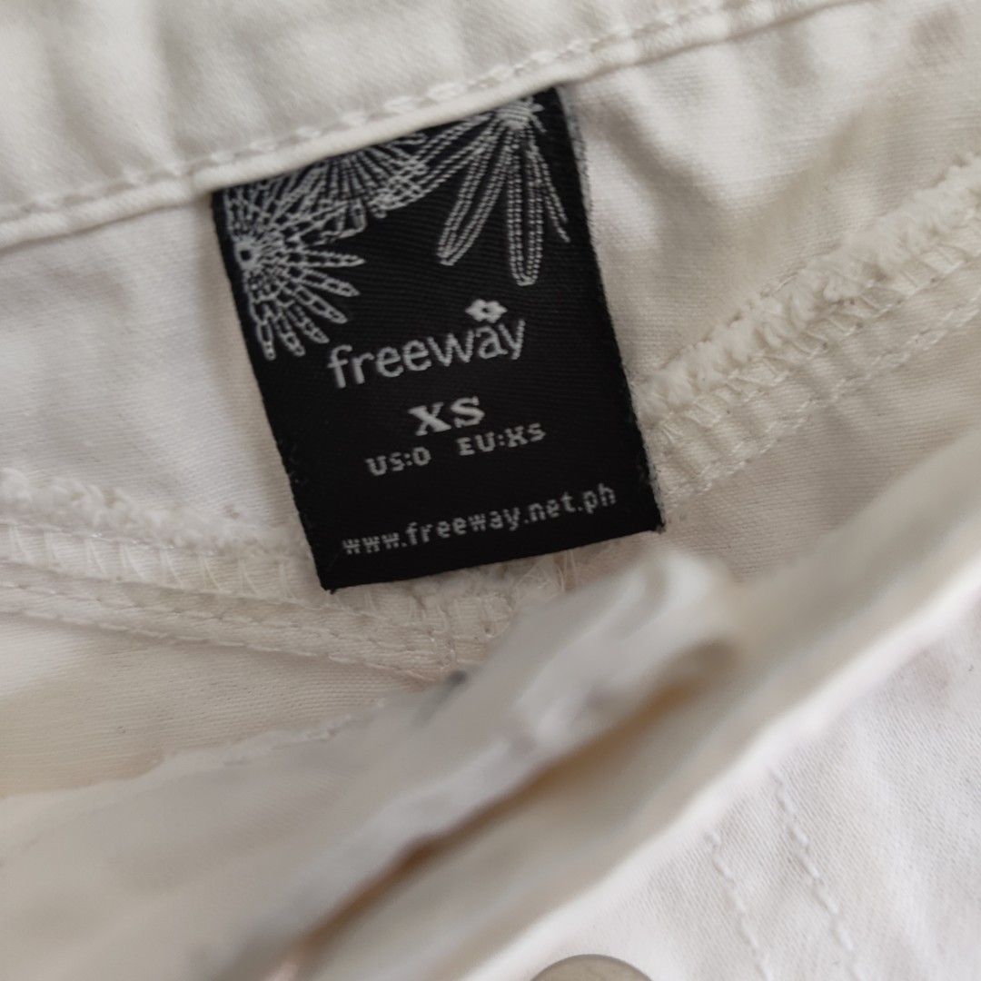 Freeway White Denim Skirt XS (Category: Skirts) located in Imus. Submitted by decluttering_millennial (Listing ID 1411873229, Image 3). Description: - Freeway white denim skirt - Mini length - Size: XS (US 0, EU XS) - Features: Button-down front, front and back pockets - Material: Sturdy denim - Perfect for casual outfits - Versatile style.