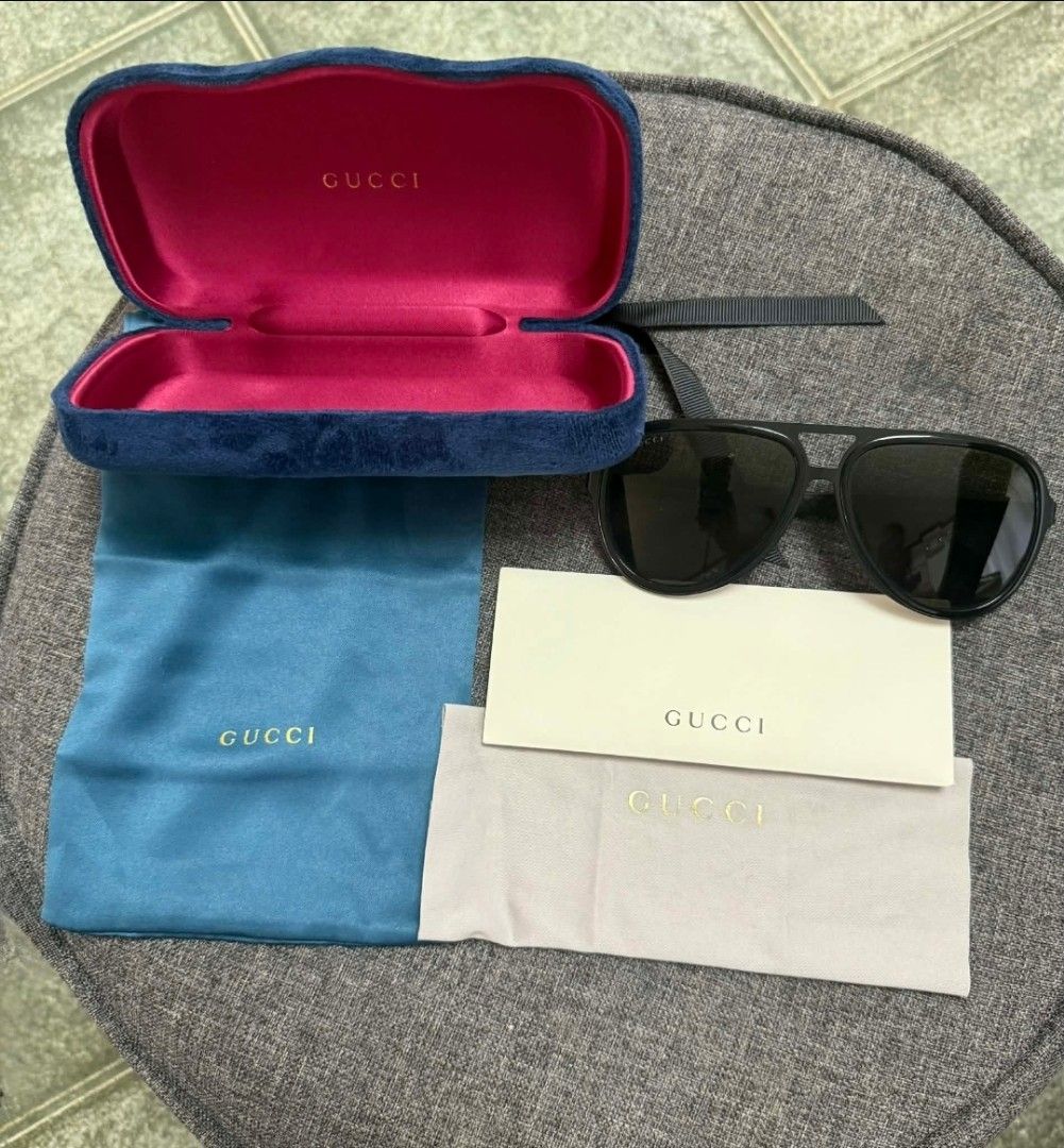 Gucci Aviator Sunglasses GG2274/S (Category: Sunglasses & Eyewear) located in Bacolod City. Submitted by mackdaddy41 (Listing ID 1411790663, Image 1). Description: Gucci Men's Aviator Sunglasses Model: GG 2274/S Color: Matte Black Lens: Dark Brown Size: 59-15-140 Still in very good condition, used only 1-2x during prenup shoot for my wedding Feels and still looks bnew Bought this with the extra velvet case for almost 19k Comes complete with lens 
