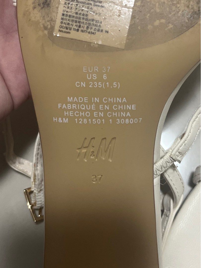 H&M White Strappy Sandals Size 37 (Category: Flats & Sandals) located in Taguig. Submitted by jsdelapena (Listing ID 1411898484, Image 3). Description: - H&M white strappy sandals - Size 37 - Features: Small heel, delicate straps, buckle - Condition: worn once to a party - rfs: too big.
