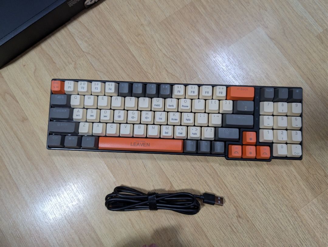 Leaven K780 78-Key Mechanical Keyboard (Category: Computer Keyboard) located in Quezon City. Submitted by geloboy10 (Listing ID 1411924751, Image 2). Description: product sold as is no defects no issue natambak lng - Leaven K780 Mechanical Keyboard - 78-key layout - Customizable RGB lighting - Keycap colors: Orange, Gray, White - Includes USB cable - Comes with original box - Ideal for gaming and everyday tasks.
