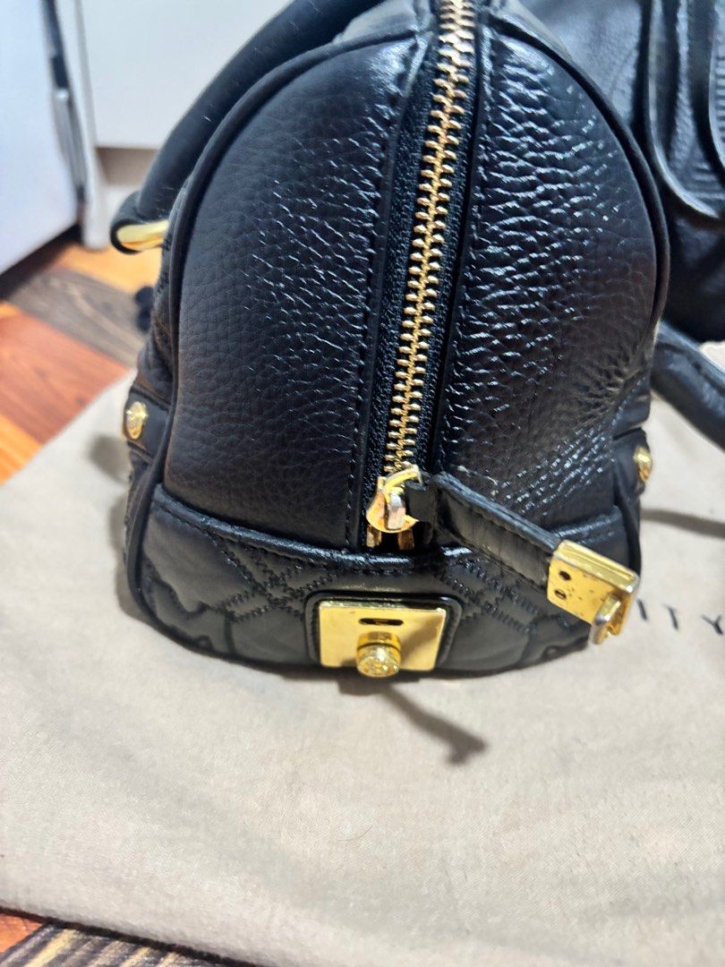 Metrocity Bags & Wallet bundle (Category: Luxury Bags & Wallets) located in Malabon City. Submitted by marionettes (Listing ID 1411934807, Image 2). Description: - Metrocity Handbag: Black, quilted design with gold-tone hardware. - Metrocity Tote Bag: Spacious interior. - Metrocity Wallet: Compact black design with zipper closure. - All items are authentic Metrocity .