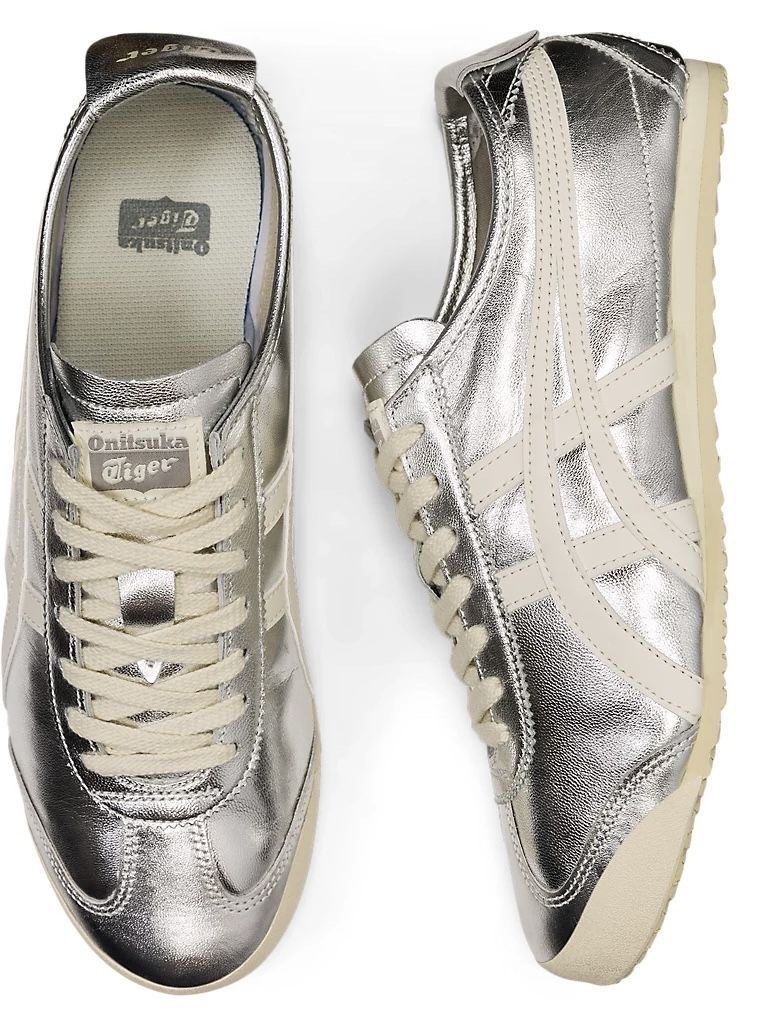 NEW Onitsuka Tiger Mexico 66 Silver Sneakers (Category: Sneakers) located in Singapore. Submitted by grrrrrrrocean (Listing ID 1411848848, Image 1). Description: - Onitsuka Tiger Mexico 66 sneakers - Silver color - Iconic stripes - Comfortable design Hello, recently got this shoes as a gift but I was planning to exchange it to another colour. The shoe hasn’t been worn before, comes in original packaging (bag and box) and the tag is still attached
