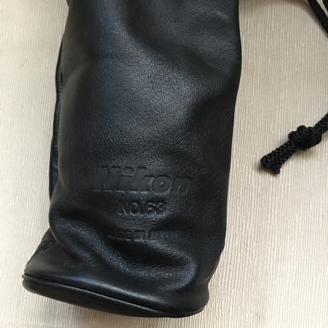 Nikon No.63 leather 6” lens pouch (Category: Other Photography Accessories) located in Tarlac. Submitted by greatfindstrlc (Listing ID 1411784850, Image 3). Description: Old leather drawstring pouch for Nikkor lens 6” or any lens. With Nifco Fixlock string buckle. Japan made, original. Black.