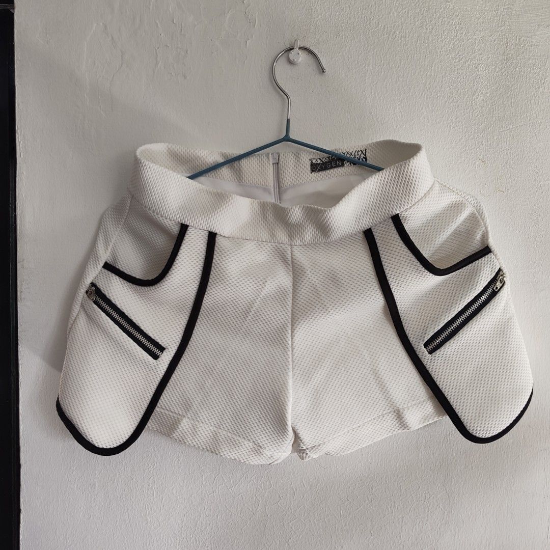 Oxygen OXGB White Shorts (Category: Shorts) located in Imus. Submitted by decluttering_millennial (Listing ID 1411871778, Image 1). Description: - Oxygen white shorts - Size 26 - High-waisted - Textured fabric - Black accents - Zipper pockets - Back zipper closure.