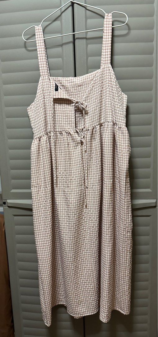 Peach Gingham Midi Dress Penshoppe (Category: Dresses) located in Quezon City. Submitted by wayvision (Listing ID 1411895652, Image 2). Description: never worn outside only worn to try rfs not my style size XL width 48 cm length 117 cm above are hand measurements so there may be a few cm discrepancies mop: gcash, maya, maribank, landbank, unionbank mod: j&t, lbc, gogo xpress, lalamove/grab.