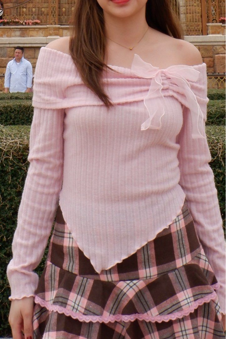 Pink Ribbed Top with Ruffle Detail (Category: Sleeveless) located in Manila. Submitted by aintchels (Listing ID 1411817046, Image 3). Description: - Pink ribbed top - Long sleeves - Unique waist knot detail - Delicate ruffle accent - Soft pink color - Lightweight material - Dress up or down.