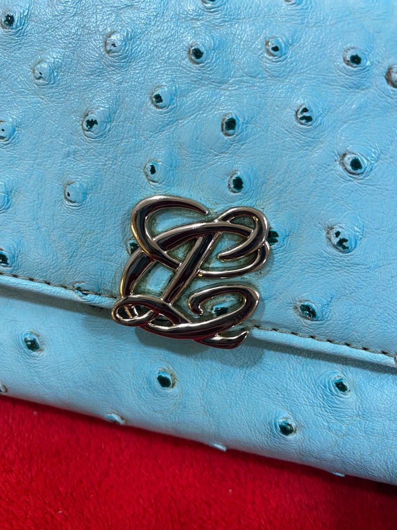 PRELOVED Louis Quatorze Ostrich Wallet (Category: Wallets & Card holders) located in Kalibo. Submitted by mariana_28 (Listing ID 1411894314, Image 3). Description: LQ trifold Ostrich in powder blue color. Flaws already posted. 8/10 rate for me. Kindly pm for any questions and make an offer if you like. .