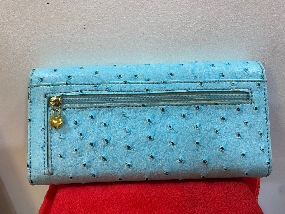 PRELOVED Louis Quatorze Ostrich Wallet (Category: Wallets & Card holders) located in Kalibo. Submitted by mariana_28 (Listing ID 1411894314, Image 2). Description: LQ trifold Ostrich in powder blue color. Flaws already posted. 8/10 rate for me. Kindly pm for any questions and make an offer if you like. .