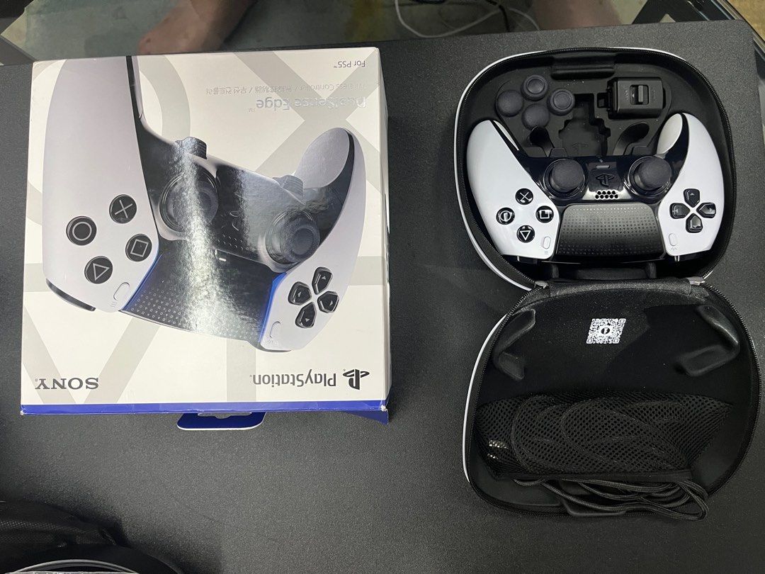 Ps5 Dual Sense Edge (Category: Controllers) located in Quezon City. Submitted by maynmiguel (Listing ID 1411855645, Image 2). Description: Brand: Sony Product: PlayStation 5 DualSense Edge Controller Color: white / black Original and authentic Rfs: not using controller Analog sticks upgraded to TMR No stick drift Includes all original accessories: - usb c charging cable - usb c charging cable lock - carrying case - 4 extra stick caps (2x low, 2x 