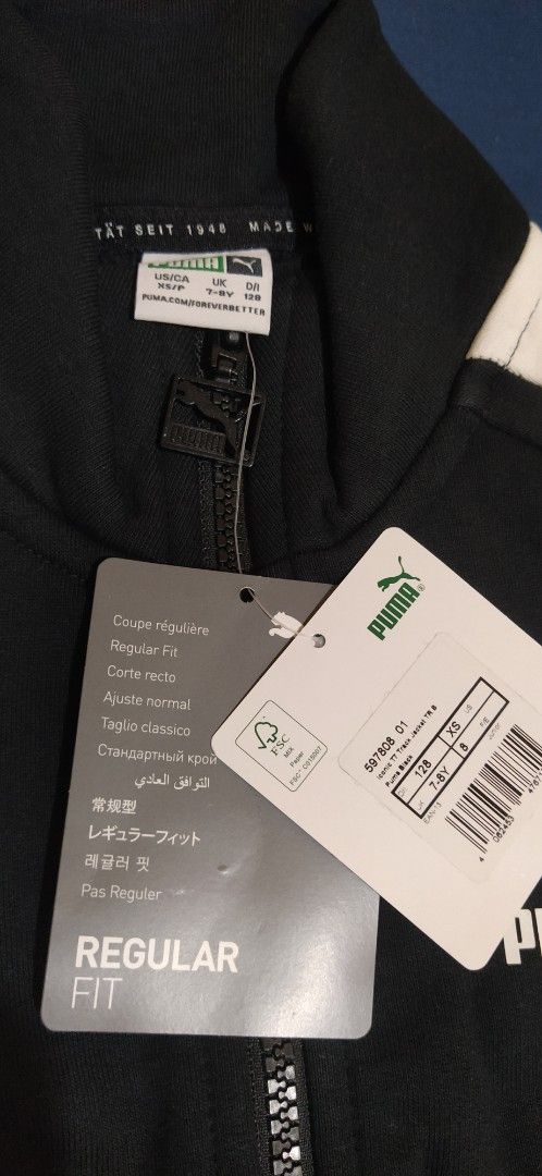Puma Track Jacket Black and White (Category: Coats, Jackets and Outerwear) located in Ligao. Submitted by travis40 (Listing ID 1411917406, Image 3). Description: Deadstock never worn rfs wrong size - Puma track jacket - Classic black and white design - Full zip closure - Stand-up collar - Puma logo on chest - White stripes on sleeves - Extra small - With tag attached.