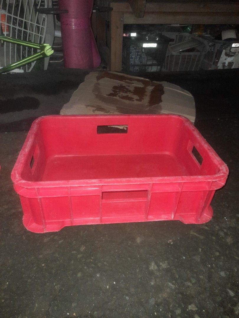 Red Plastic Storage Crate (Category: Storage Boxes & Baskets) located in Valenzuela. Submitted by newbear.425b6e (Listing ID 1411872697, Image 1). Description: - Red plastic storage crate - Rectangular shape - Open handles for easy carrying - Lattice design on sides - Solid base - Ideal for various storage needs - Practical and versatile -surplus 250 po ung maliit, ung malaki po 300.
