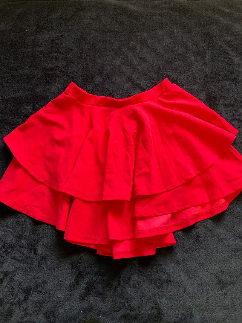 Red Two Layer Hem Skirt (Category: Skirts) located in Imus. Submitted by declutterwithria (Listing ID 1411841791, Image 1). Description: - Vibrant red tiered skirt - Features a layered design - Made of soft fabric - Comfortable waistband - Flattering silhouette - Versatile for various outfits READ BEFORE INQUIRING! -Most items are preloved unless stated otherwise. -First to pay gets the item‼️ -Shipping day is every Friday only‼️ 📌 STRICTLY NO R