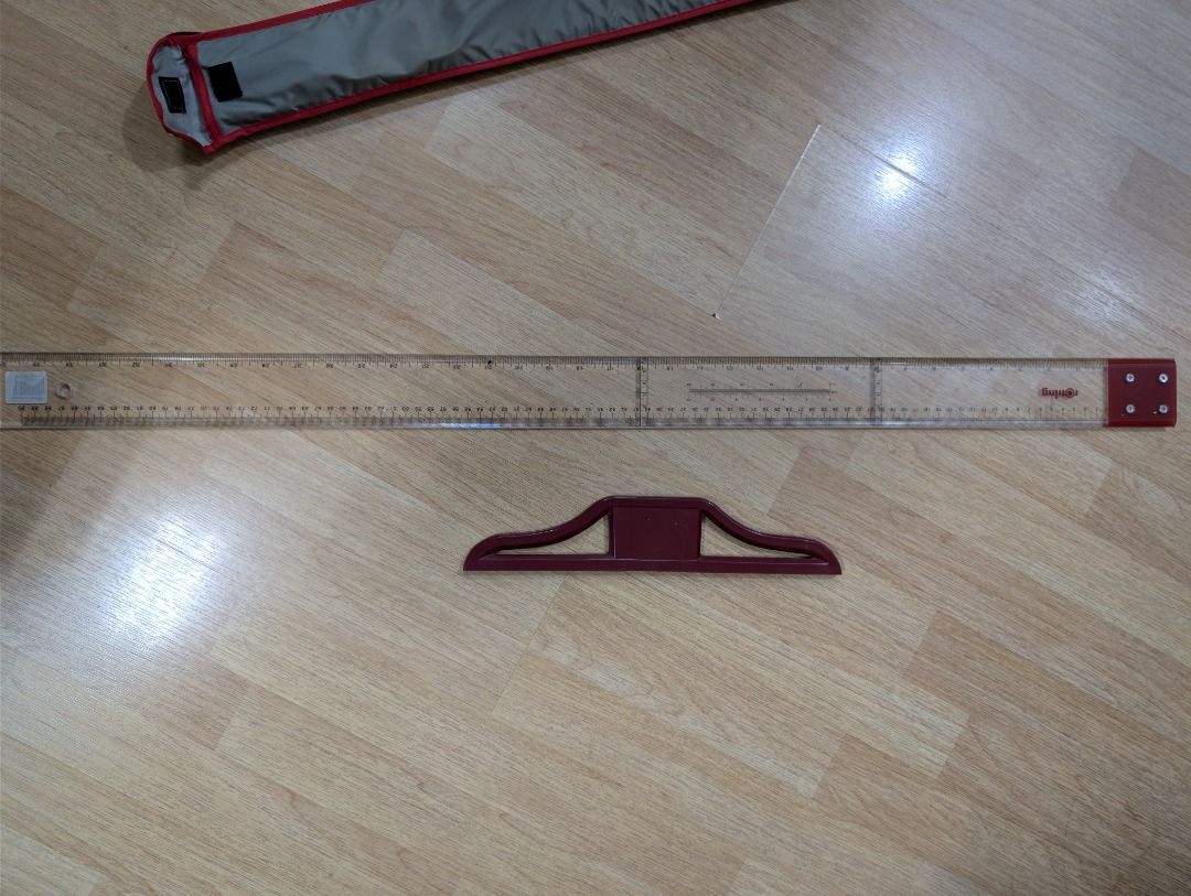 Rotring Drafting Ruler Set (Category: Stationery & School Supplies) located in Quezon City. Submitted by geloboy10 (Listing ID 1411924306, Image 1). Description: product sold as is - Rotring drafting set - Includes ruler, triangle, and carrying case - Ruler with clear markings and red end - Gray carrying case with red trim and Rotring logo.
