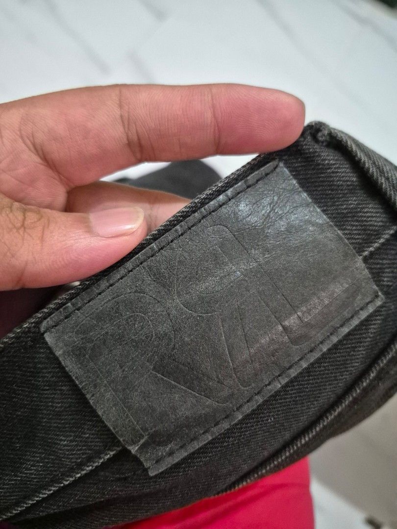 RRL Double RL Denim Jeans 30x30 (Category: Jeans) located in Bulacan. Submitted by vince4593 (Listing ID 1411843355, Image 3). Description: RRL Double RL denim jeans in black. Features a zip fly and slim narrow fit. Made in Mexico. Size is 30x30. The jeans have a leather patch on the back. The zipper has "DOUBLE RL" and "RIVETED" engraved on it. The inner tag shows the supplier and material information..