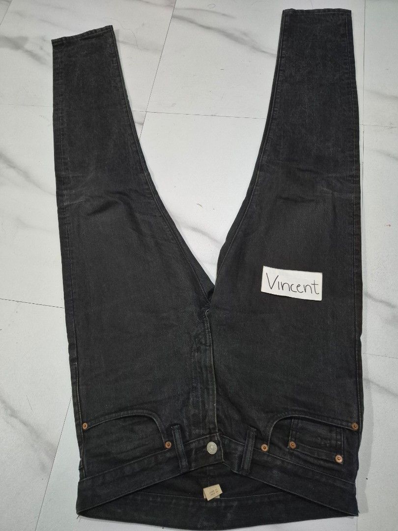 RRL Double RL Denim Jeans 30x30 (Category: Jeans) located in Bulacan. Submitted by vince4593 (Listing ID 1411843355, Image 1). Description: RRL Double RL denim jeans in black. Features a zip fly and slim narrow fit. Made in Mexico. Size is 30x30. The jeans have a leather patch on the back. The zipper has "DOUBLE RL" and "RIVETED" engraved on it. The inner tag shows the supplier and material information..