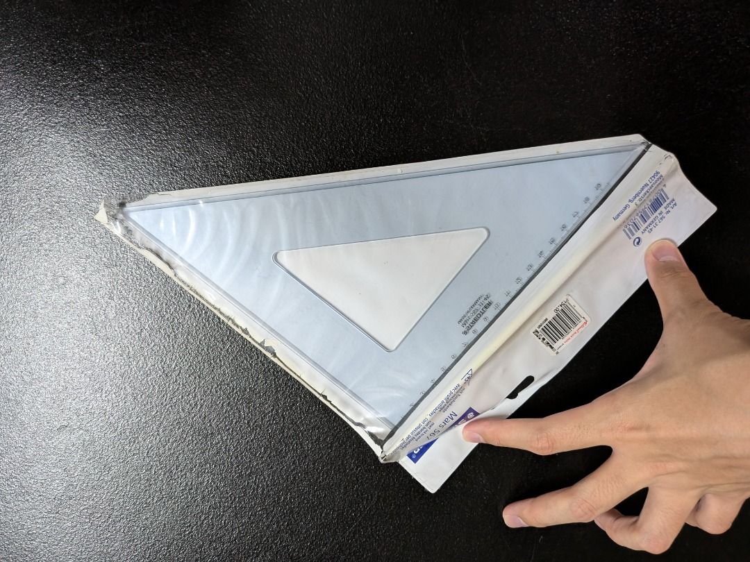 Staedtler Triangle Ruler 45 degrees (Category: Stationery & School Supplies) located in Quezon City. Submitted by geloboy10 (Listing ID 1411923605, Image 1). Description: product sold as is - Like new triangle ruler - From National Book Store - Still in original packaging - Features measurement markings - Ideal for students and precise work - Price: ₱154.00.
