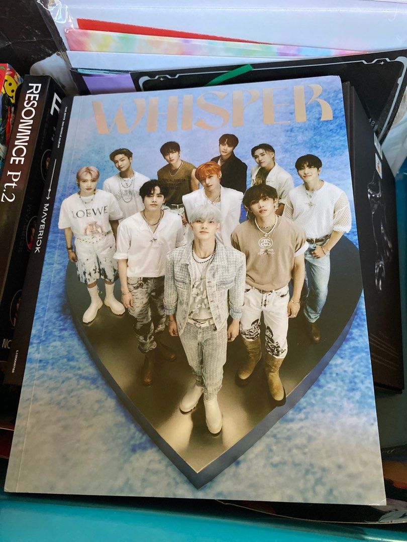 The Boyz: WHISPER Album with random inclusions (Category: CDs & DVDs) located in Pasig City. Submitted by alaineeeee (Listing ID 1411856579, Image 1). Description: - WHISPER album - Heart-shaped album cover - Features a group of people.