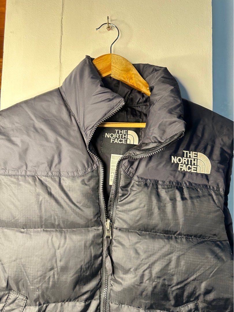 The North Face Puffer Vest - Goose Down (Category: Vests) located in Makati City. Submitted by rosie.cpa (Listing ID 1411801538, Image 2). Description: - Authentic - Black The North Face puffer jacket/ vest -Goose down insulation - Full zip closure - 22x26 - The North Face logo on chest - High collar for warmth - Great for layering - Perfect for autumn and winter.