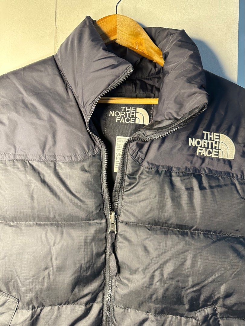 The North Face Puffer Vest - Goose Down (Category: Vests) located in Makati City. Submitted by rosie.cpa (Listing ID 1411801538, Image 3). Description: - Authentic - Black The North Face puffer jacket/ vest -Goose down insulation - Full zip closure - 22x26 - The North Face logo on chest - High collar for warmth - Great for layering - Perfect for autumn and winter.