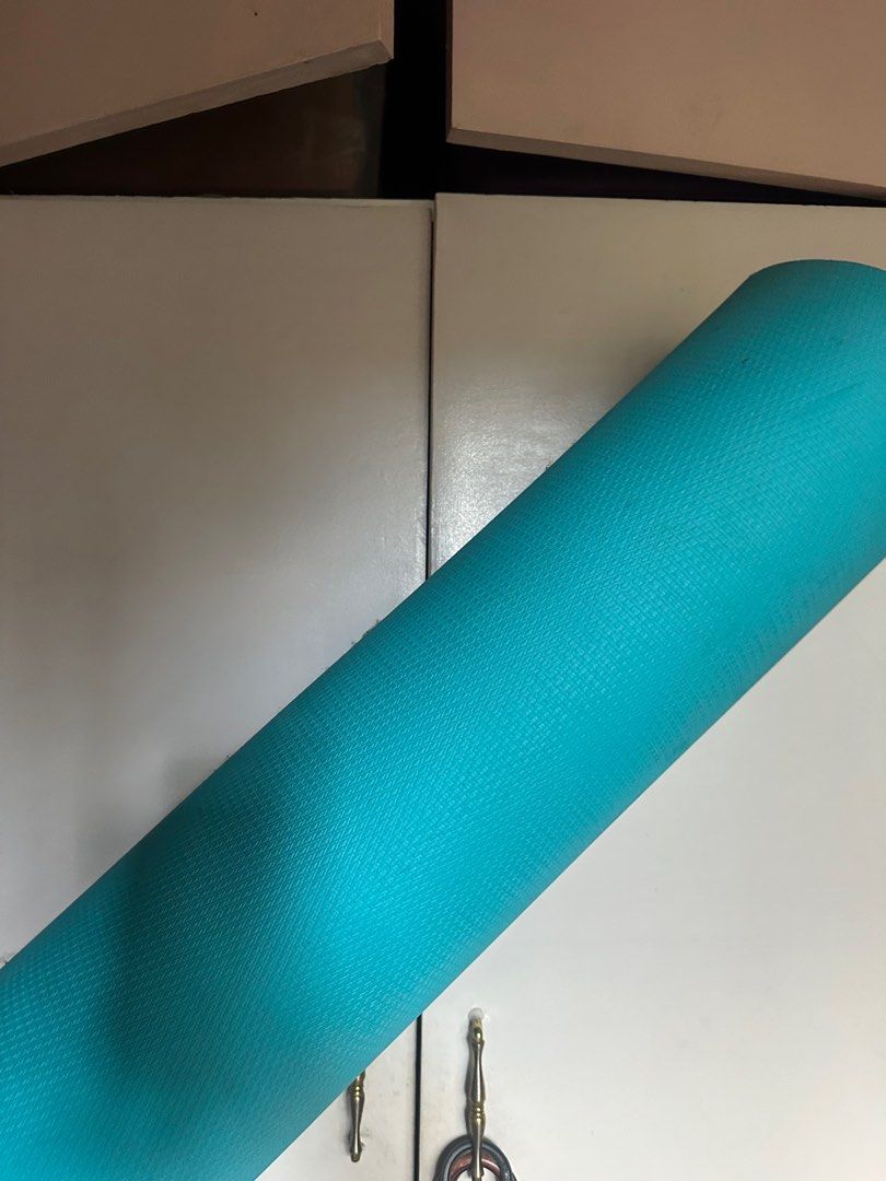 Turquoise Yoga Mat (Category: Exercise Mats) located in Quezon City. Submitted by niftystuff.ph (Listing ID 1411861337, Image 2). Description: - Turquoise yoga mat - Perfect for home workouts - Textured surface for better grip - Easy to roll up and store - Ready to use.