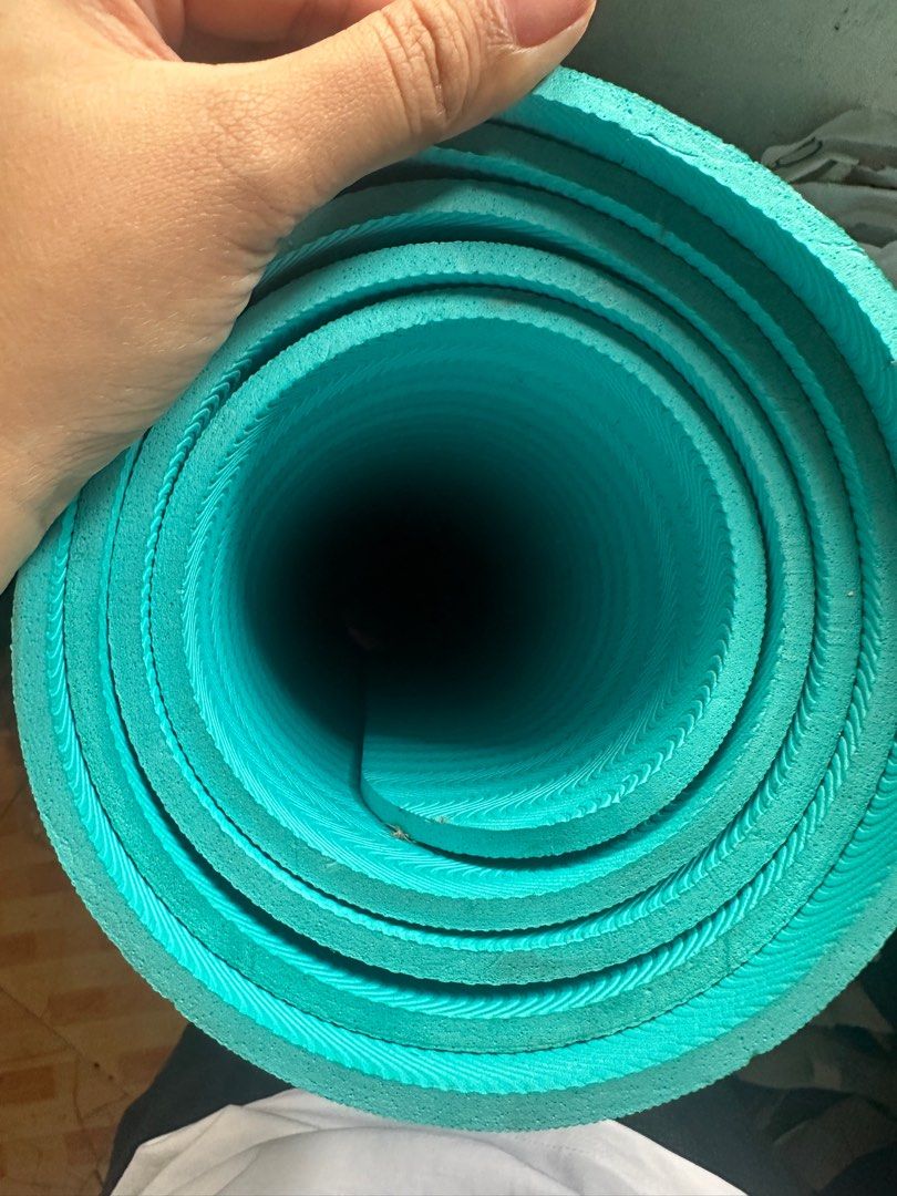 Turquoise Yoga Mat (Category: Exercise Mats) located in Quezon City. Submitted by niftystuff.ph (Listing ID 1411861337, Image 1). Description: - Turquoise yoga mat - Perfect for home workouts - Textured surface for better grip - Easy to roll up and store - Ready to use.