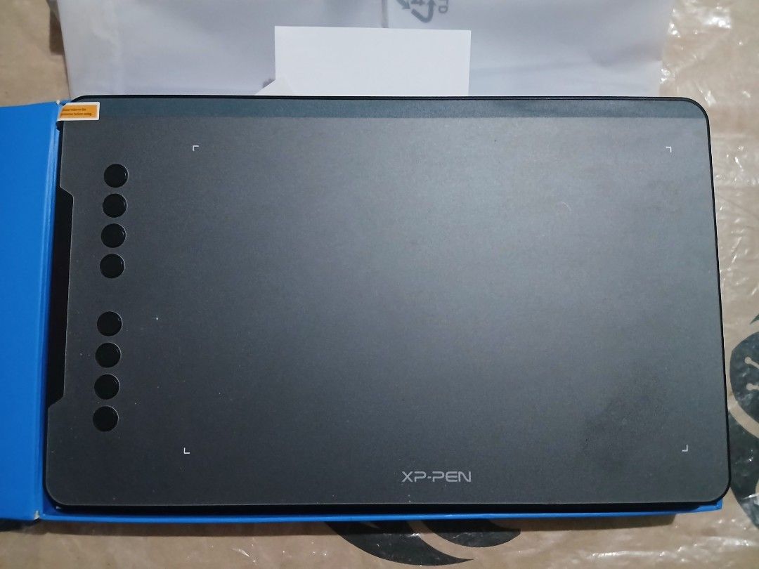 XPPen Deco 01 V3 (Category: Other Gadgets) located in Lipa City. Submitted by declutteraub. (Listing ID 1411921944, Image 2). Description: Digital Graphic Drawing Tablet (10 inch) Package Includes: 1x Drawing Tablet 1x USB Cable 1x USB to USB-C Adapter 1x Battery-free Stylus 8x Replacement Nibs 1x Anti-fouling Drawing Glove 1x Stylus Stand 1x Protective Film 1x Quick Guide Compatibility: Compatible with Windows 7 (or later), Android 10.0 (or late