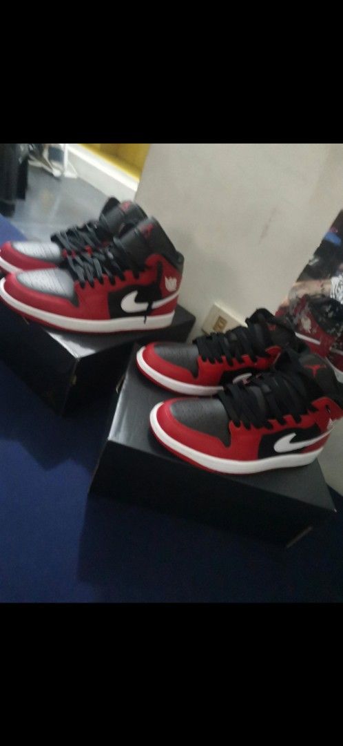 Air Jordan 1 Mid - Black/Red (Category: Sneakers) located in Makati City. Submitted by pausammy (Listing ID 1412026783, Image 1). Description: - Air Jordan 1 Mid - Black and red colorway - White midsole - Black laces - Nike swoosh visible - Includes original box - NEGOTIABLE size 7 Men's 4500 --- > 3700 fast break.