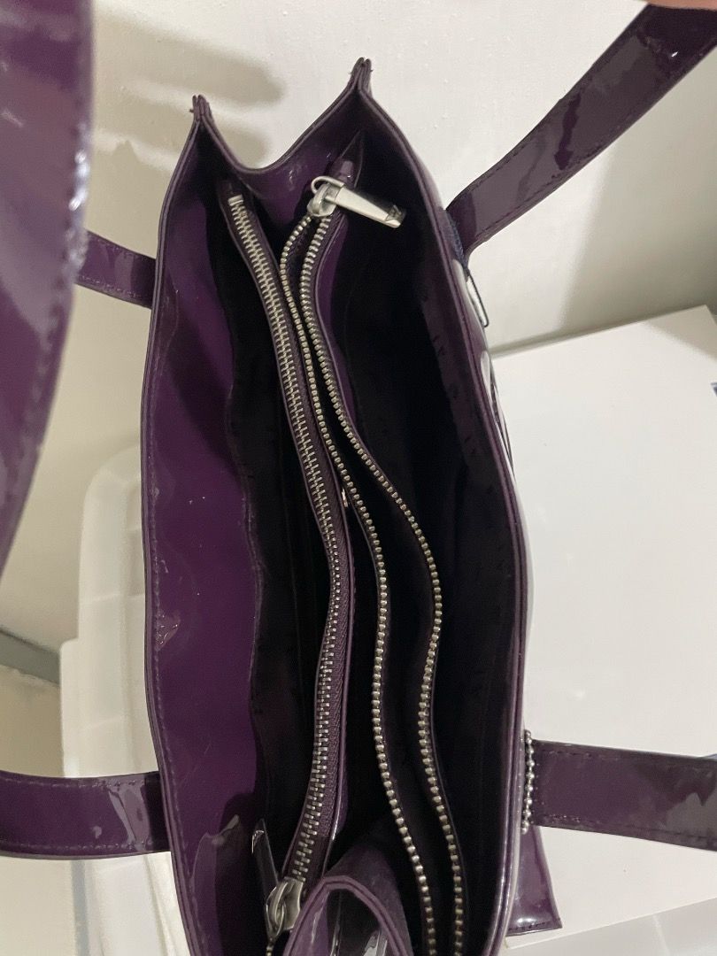 Armani Jeans Violet Bag (Category: Tote Bags) located in Magalang. Submitted by byali (Listing ID 1412096254, Image 2). Description: Armani Jeans tote/hand bag Glossy purple finish Detachable charm included Comes with original tag Bought in Italy Multiple compartments with pockets (5 compartments in total, 3 pockets).