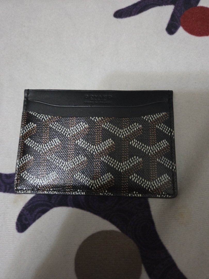 Authenric, Leather, Goyard Card Holder (Category: Luxury Bags & Wallets) located in Manila. Submitted by sterling_grace (Listing ID 1412023469, Image 1). Description: - Authentic, leather, Goyard card holder - Signature chevron pattern - Black leather exterior - Contrasting interior color - Multiple card slots - Sleek and compact design .